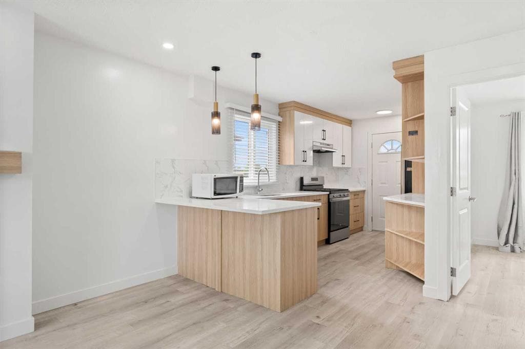 5-bed Detached for sale at 424 Penbrooke Crescent SE, Calgary