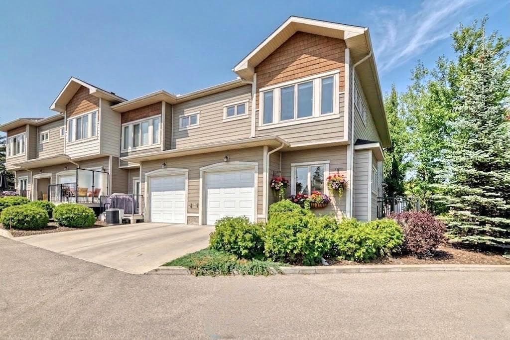 3-bed Townhouse for sale at 12 Cougar Ridge Landing SW, Calgary