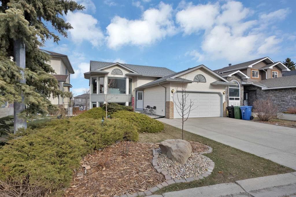 147 Harvest Oak Crescent NE — photo 1