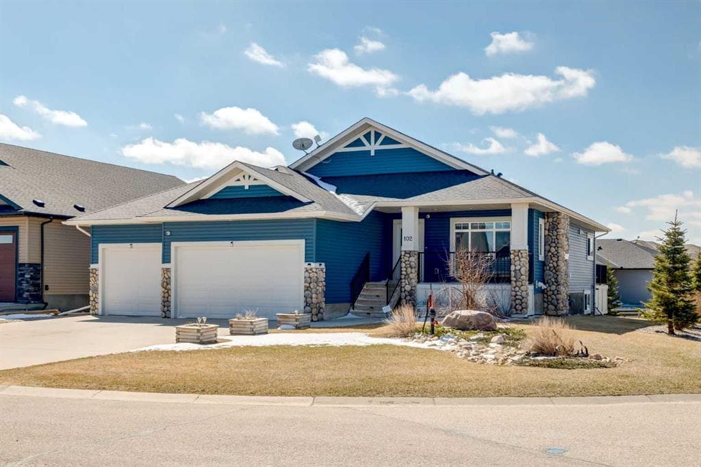 5-bed Detached for sale at 102 Speargrass Crescent, Carseland