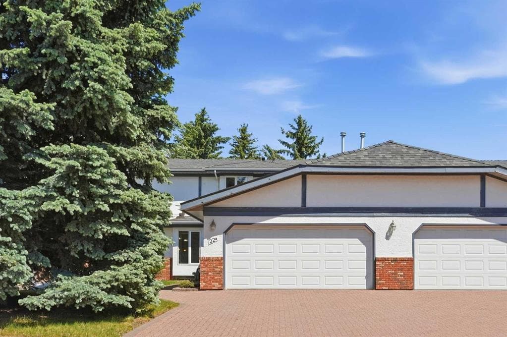 2-bed Townhouse for sale at 22A Woodmeadow Close SW, Calgary