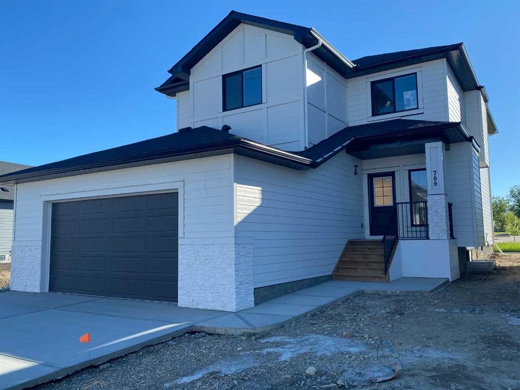 3-bed Detached for sale at 709 MANDALAY Avenue NW, Carstairs