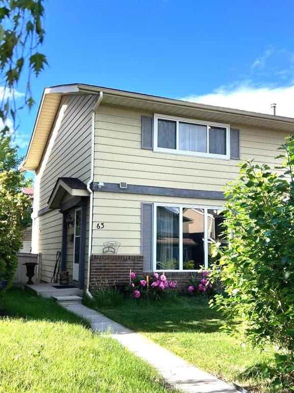 3-bed Semi-detached for sale at 63 Strathcona Crescent SW, Calgary