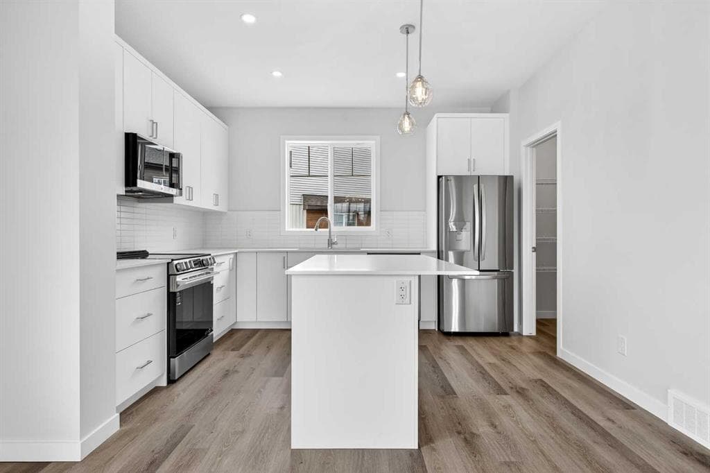 4-bed Townhouse for sale at 104, 28 Red Embers Plaza NE, Calgary