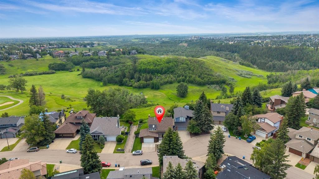 6-bed Detached for sale at 24 Woodgrove Crescent SW, Calgary