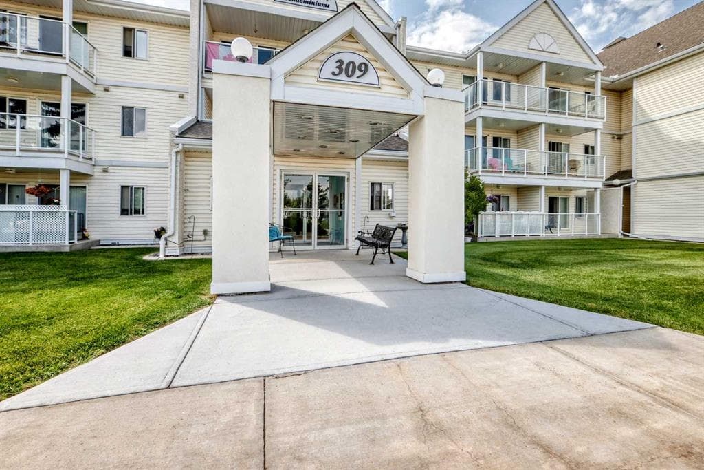2-bed Apartment for sale at 307, 309 Woodside Drive NW, Airdrie