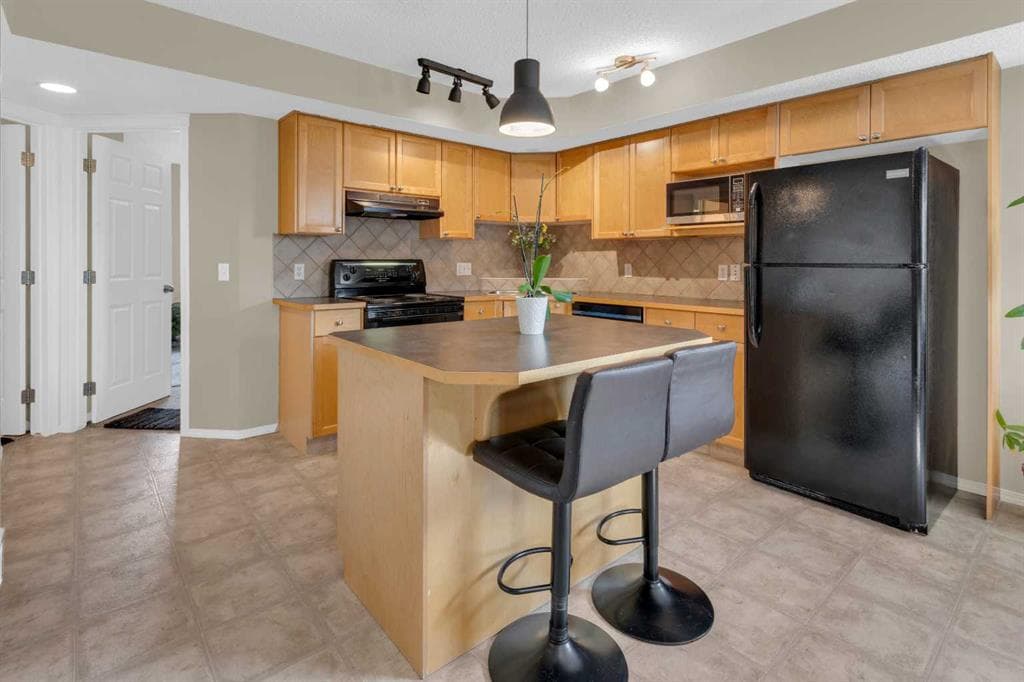 411, 140 Sagewood Boulevard SW — photo 1