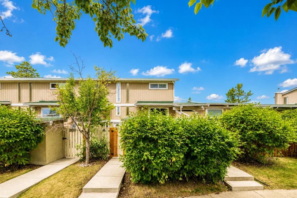 403, 11010 Bonaventure Drive SE — photo 1