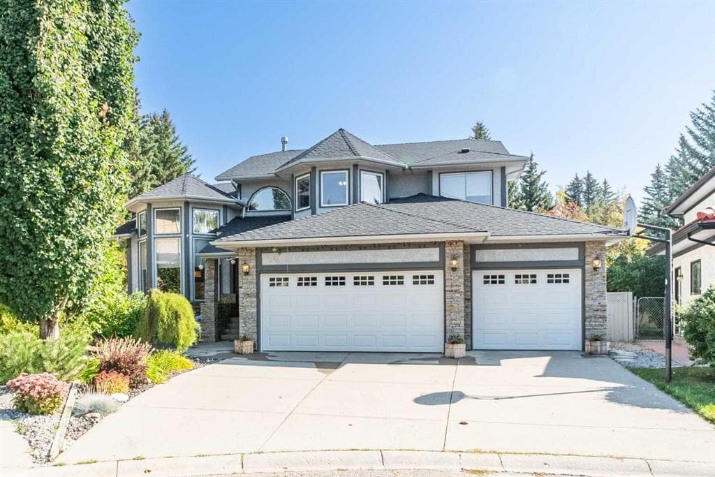 4-bed Detached for sale at 307 Woodhaven Bay SW, Calgary