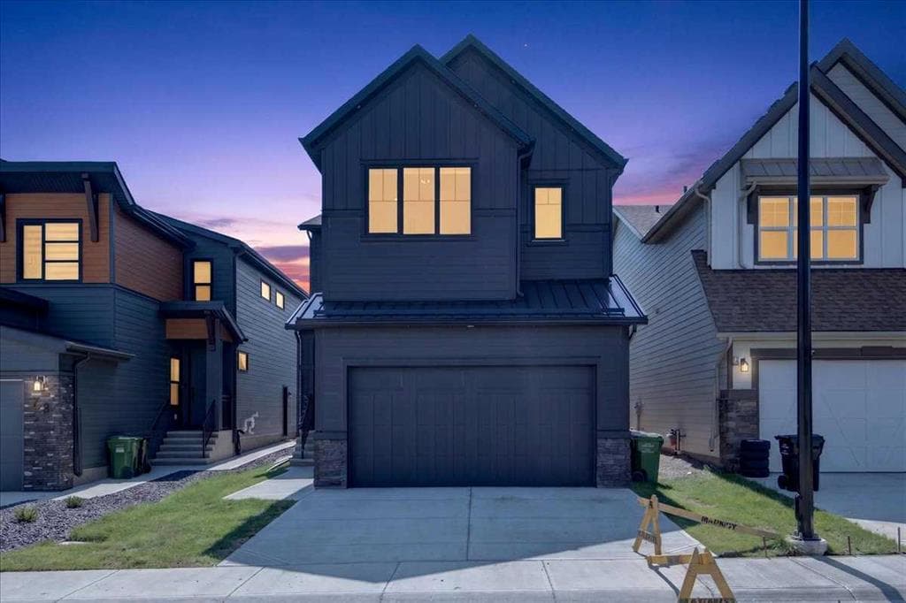 5-bed Detached for sale at 77 Rowmont Common NW, Calgary