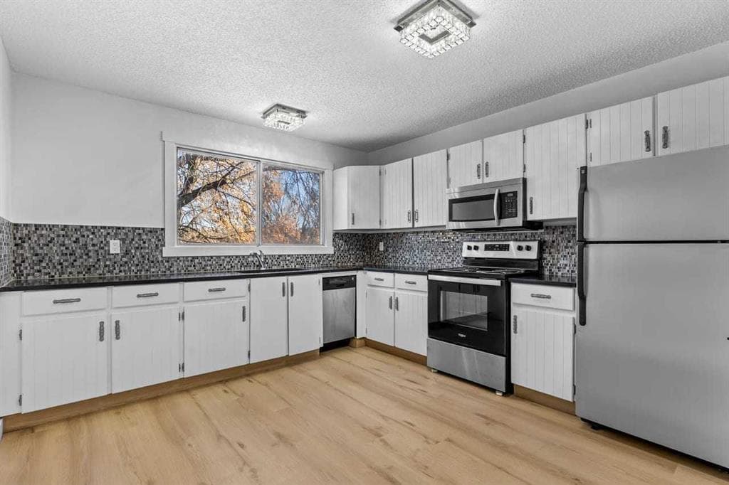 3-bed Semi-detached for sale at 7006A Bowness Road NW, Calgary