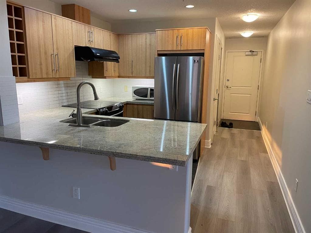 1406, 55 Spruce Place SW — photo 1