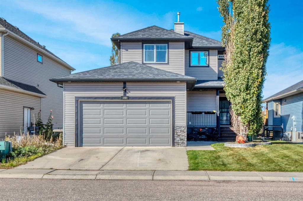 148 Aspen Creek Crescent — photo 1
