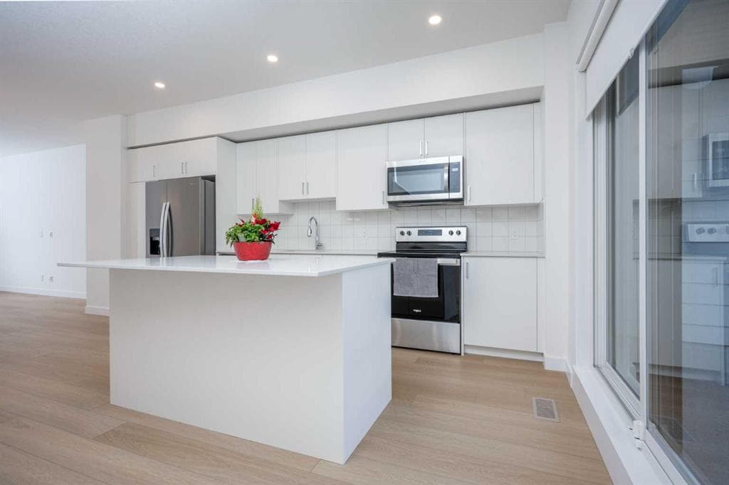 4-bed Townhouse for sale at 302, 8535 19 Avenue SE, Calgary
