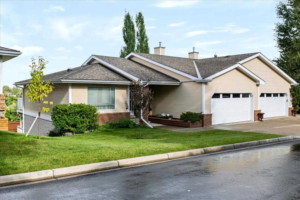 3-bed Semi-detached for sale at 36, 140 Strathaven Circle SW, Calgary