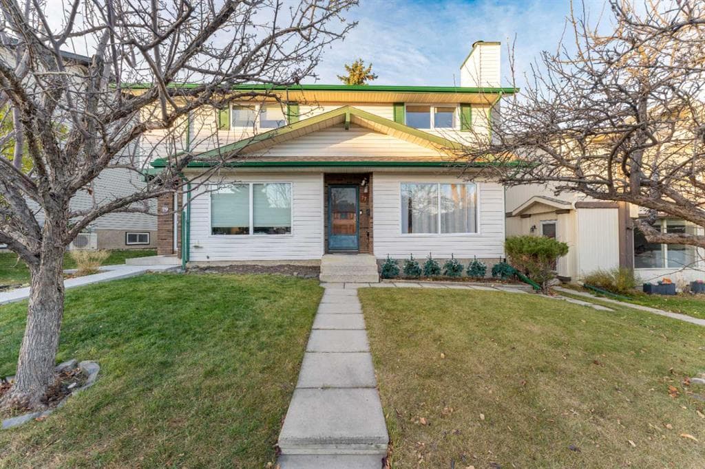 4-bed Semi-detached for sale at 77 Strathcona Crescent SW, Calgary