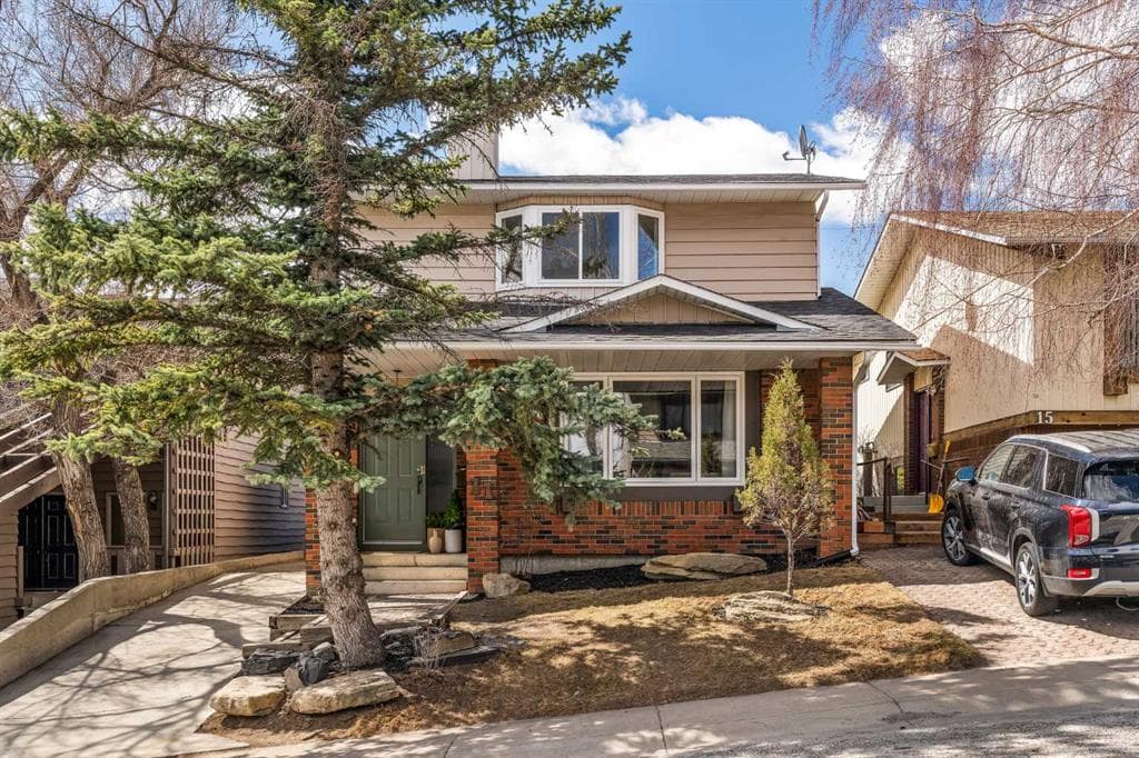 4-bed Detached for sale at 11 Coach Manor Rise SW, Calgary