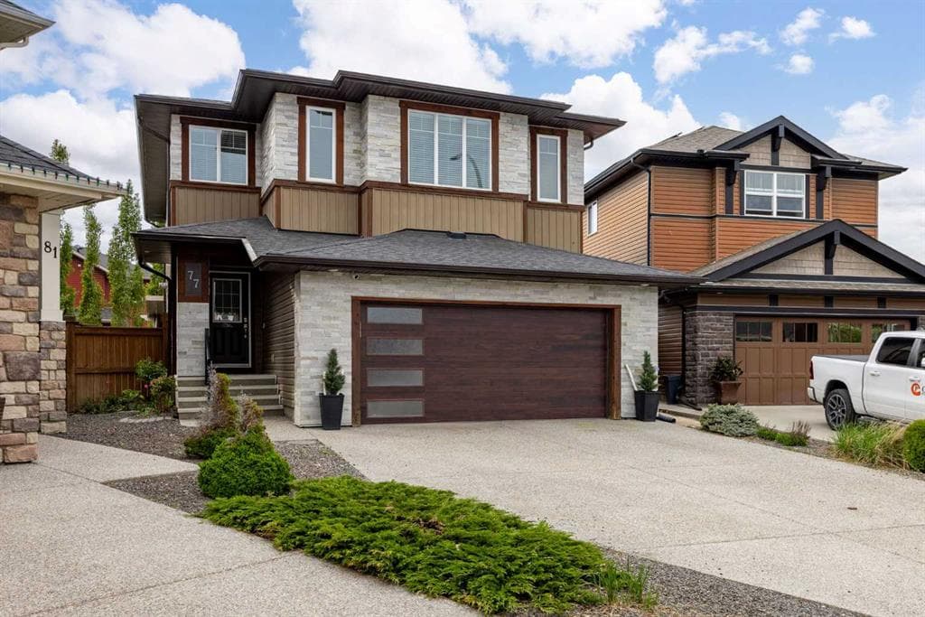 4-bed Detached for sale at 77 Cougar Ridge Cove SW, Calgary