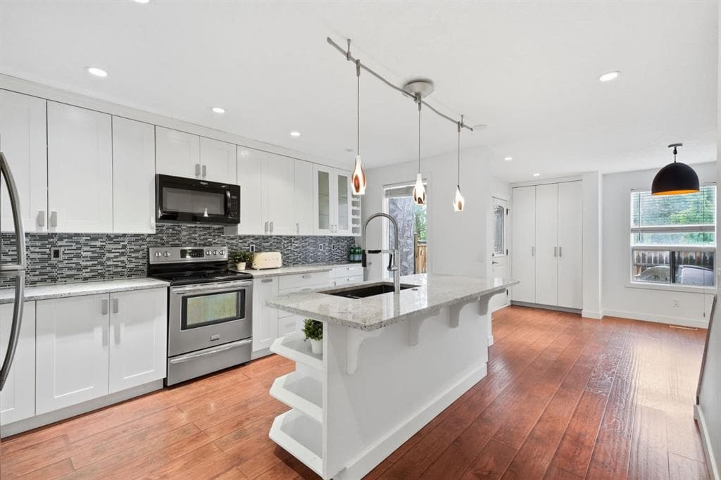3-bed Townhouse for sale at 6507 Huntsbay Road NW, Calgary