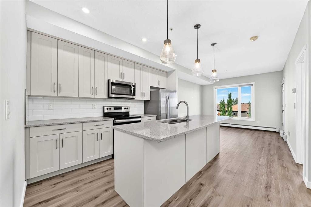 1-bed Apartment for sale at 205, 71 SHAWNEE Common SW, Calgary